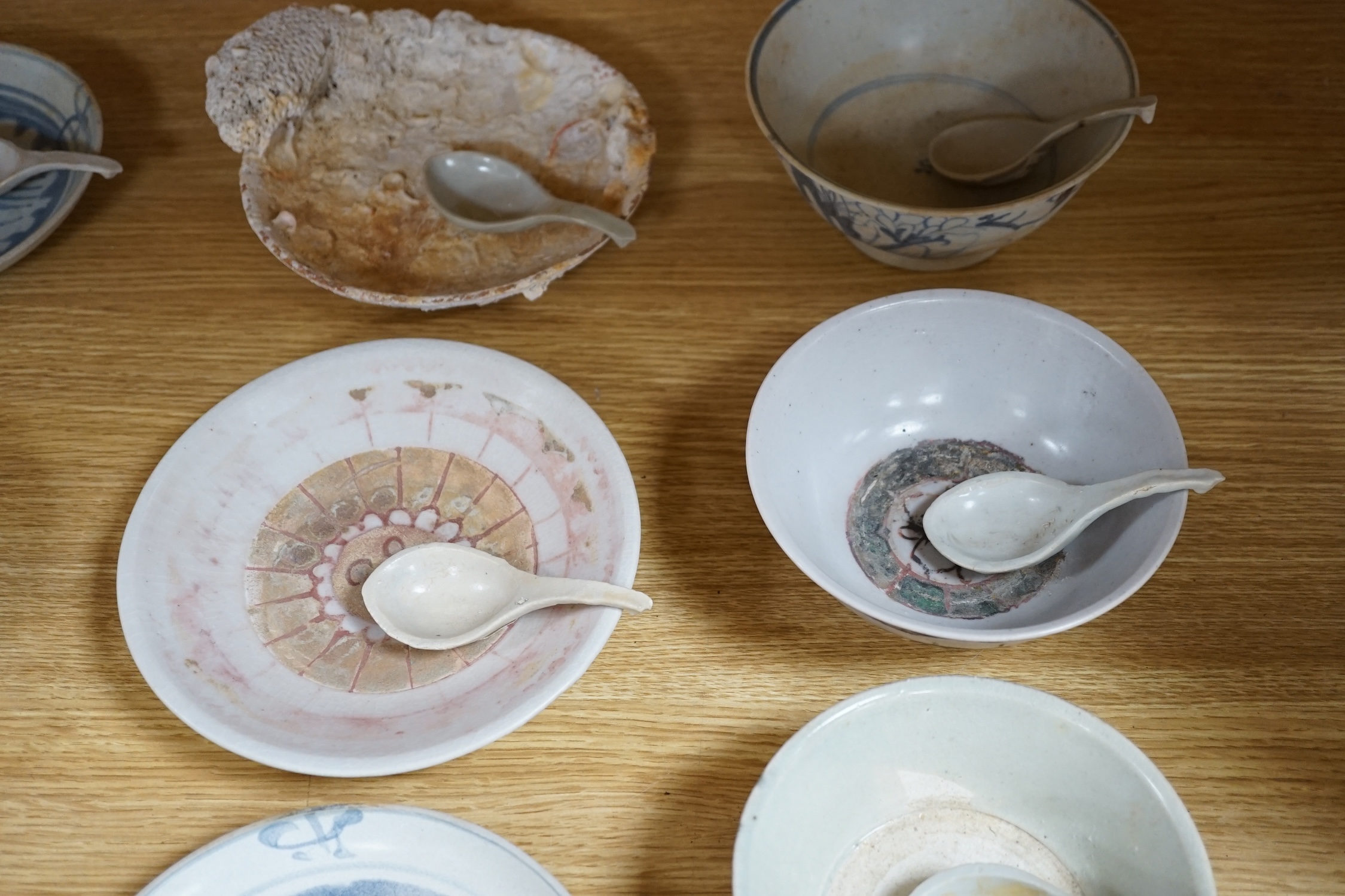 A group of Chinese Tek Sing cargo wares, including blue and white or enamelled plates, bowls, spoons, tea bowls, etc. (42)
